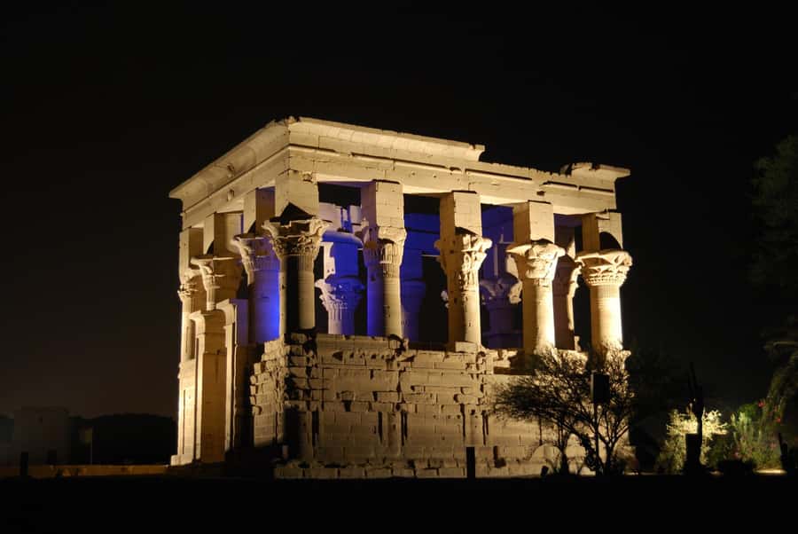 Aswan: Philae Temple Sound & Light Show with Entrance Fees - Philae Temple at night, with Isis in the spotlight