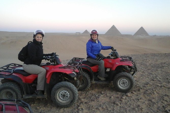 ATV Ride at the Desert of Giza Pyramids - Riding across the sand with the pyramids behind you