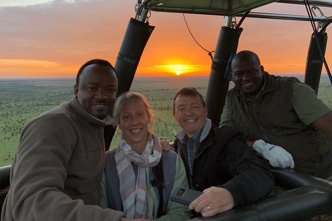 Balloon Safari & Bush Breakfast in Serengeti - Miracle Experience - Landing, bubbly, and the traditional celebration