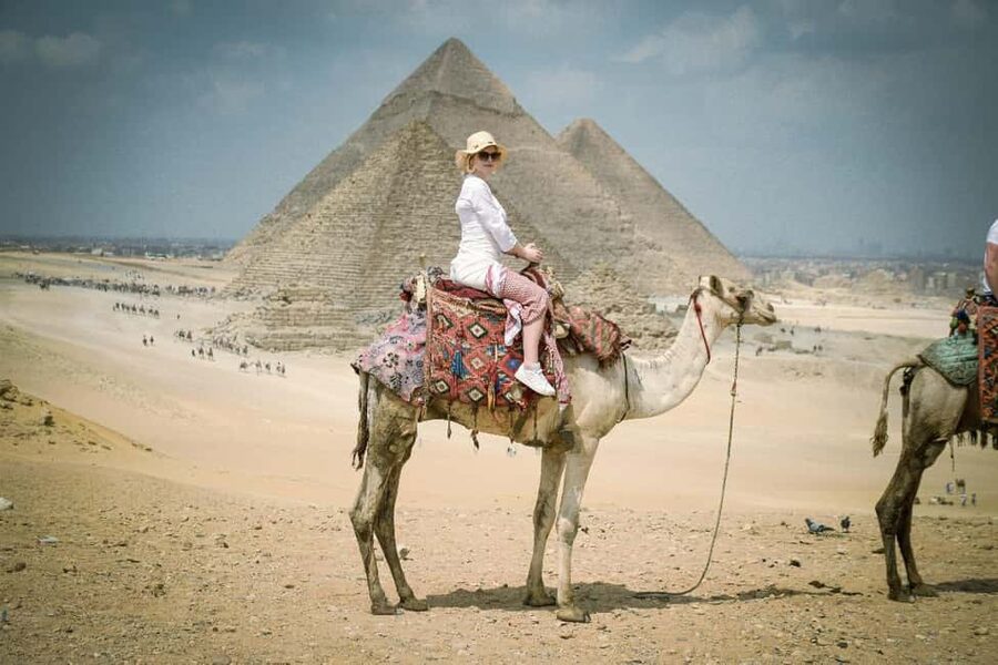Cairo Day Tour: Pyramids, Museum, Camel Ride & Local Lunch - Optional papyrus, bazaar, and Nile additions