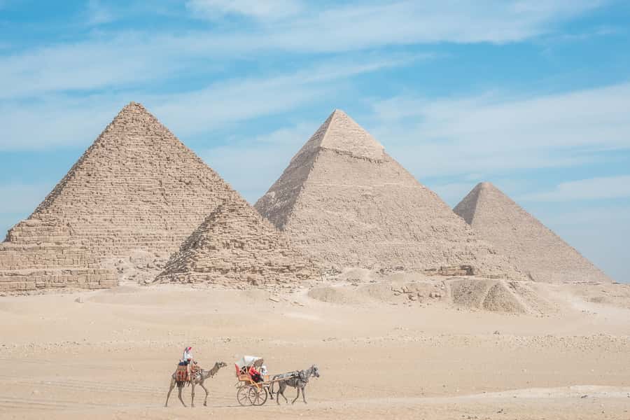 Cairo: Half Day Pyramids Tour by Camel or Horse Carriage - The guide and driver shape the day