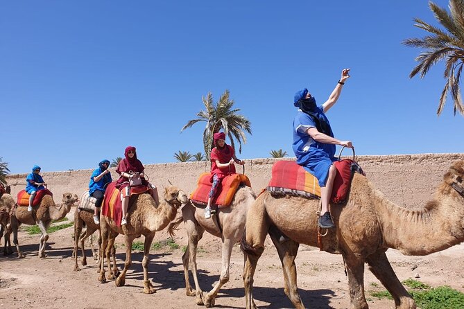 Camel ride Marrakech - Getting dressed for the photographs