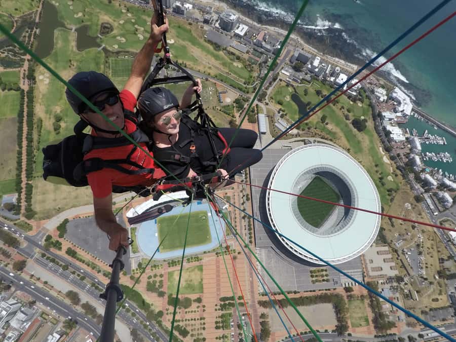 Cape Town: Tandem Paragliding Adventure - Landing, photos, and the ride back