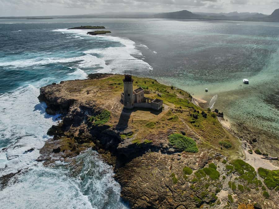 Catamaran Mauritius: South East 5 Islands Catamaran Cruises - Ile aux Fouquets lighthouse and Ile aux Aigrettes