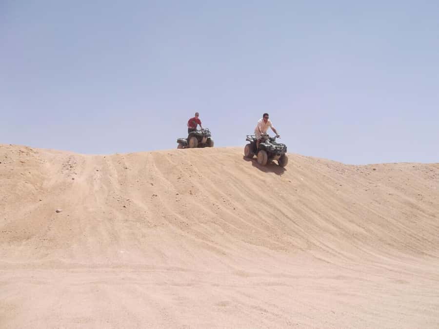 Desert Sunset Quad Bike ATV for 50Km, Oriental Show, Dinner, - The Bedouin village and short camel ride