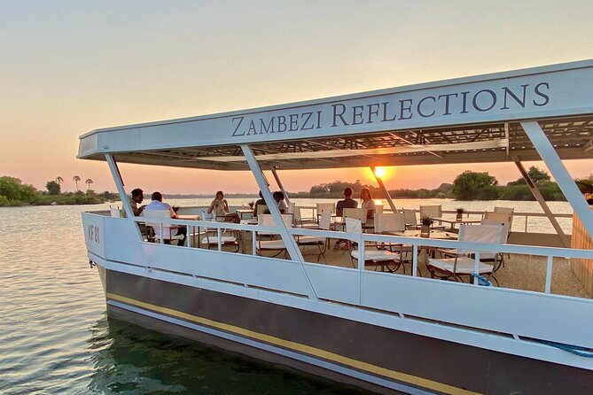Dinner Cruise on the Zambezi River - Sunset, mist, and the Victoria Falls connection