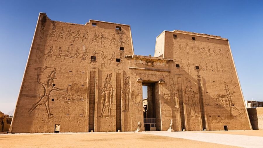 From Aswan: Overnight Nile Cruise to Luxor with Meals - Kom Ombo at sunset, with two gods under one roof