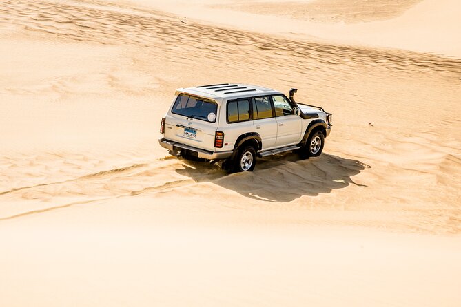 From Cairo 4x4 Safari, Camel Ride, Magic Lake, Waterfalls & Lunch - Mudawara Mountains and the changing Magic Lake