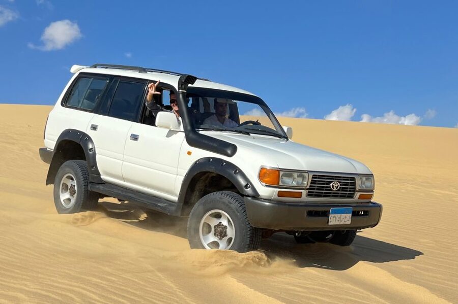 From Cairo: Desert Safari, Camel Ride, Magic Lake, & Lunch - Mudawara Mountain gives you the broad view