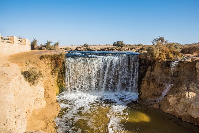 From Cairo: Desert Safari, Waterfalls, Sand boarding and Camel ride with Lunch - Mudawara Mountain Views and 4x4 Desert Driving