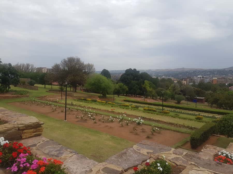 From Johannesburg: Pretoria Half Day Tour - Church Square and Pretoria City Hall from the road