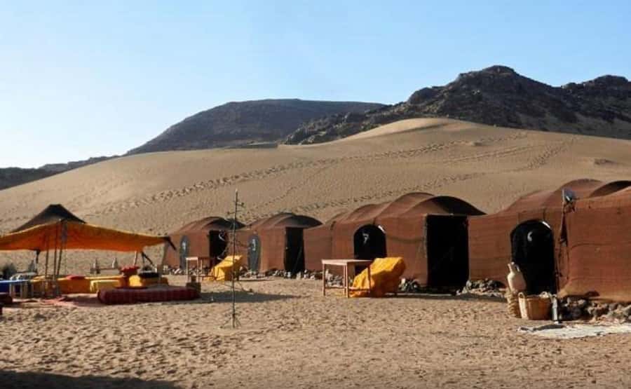 From Marrakech: 2-Days luxurious experience to Zagora Desert - The sunset camel ride into rocky Zagora