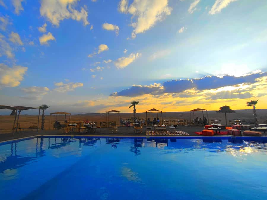 From Marrakech: Agafay Desert Sunset Dinner with Live Show - Arriving in the Agafay Desert