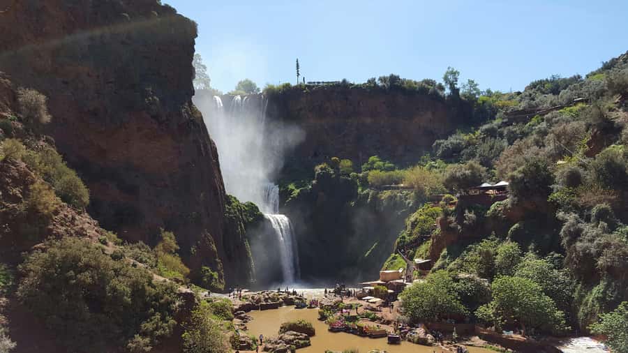 From Marrakech: Day Tour to Ouzoud Waterfalls - Arriving at Ouzoud and walking through the olive groves