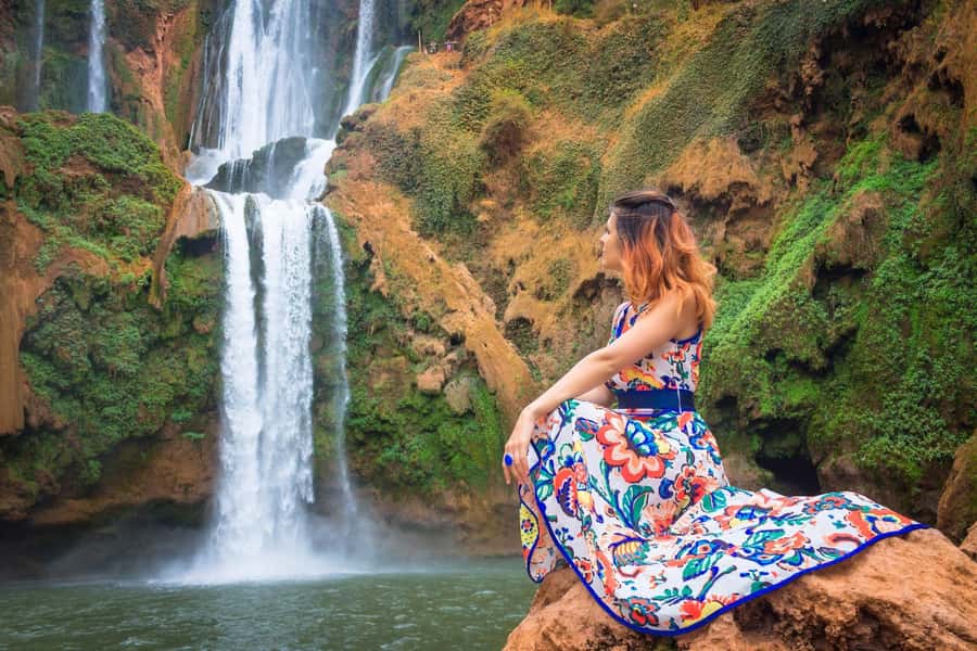 From Marrakech: Guided Ouzoud Waterfalls Tour with Boat Ride - The boat ride puts you under the falling water