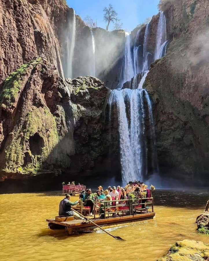 From Marrakech:Ouzoud Waterfalls Day Trip with Boat Tour - Taking the boat beneath the 110-meter falls