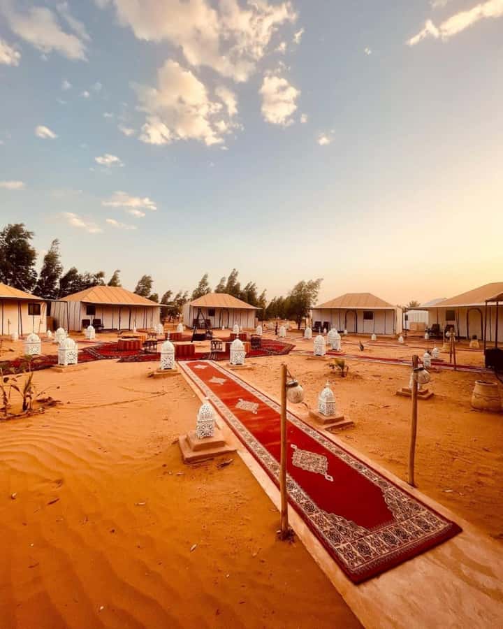 From Merzouga: Overnight Camel Trek over Erg Chebbi Dunes - From the Kasbah pool to the camel park