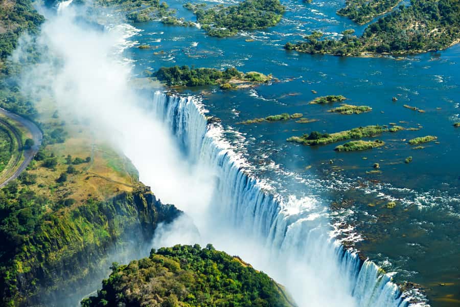 From Victoria Falls: Livingstone Island Tour & Devils Pool - The five-minute boat ride to Livingstone Island