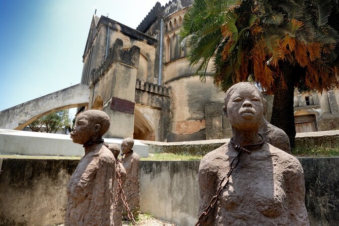 Full-Day Private Stone Town +Spice Farm and Prison Island Tour - Stone Town begins with carved doors and colonial buildings
