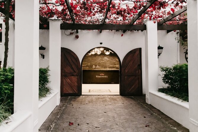 Full Day Small Group Wine Tour Cape Town and Stellenbosch - Lovane finishes with wine and custom-made chocolate