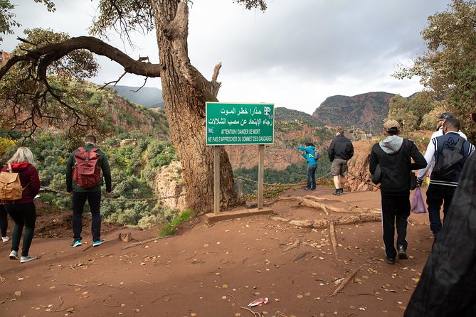 Full Day Trip To Ouzoud Waterfalls From Marrakech & Boat Tour - The descent to the river, with steep paths and rough steps