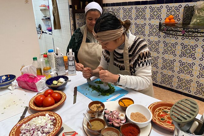 Half-Day Cooking Class with Local Chef Laila in Marrakech - Preparing the main course with Ras Elhanout