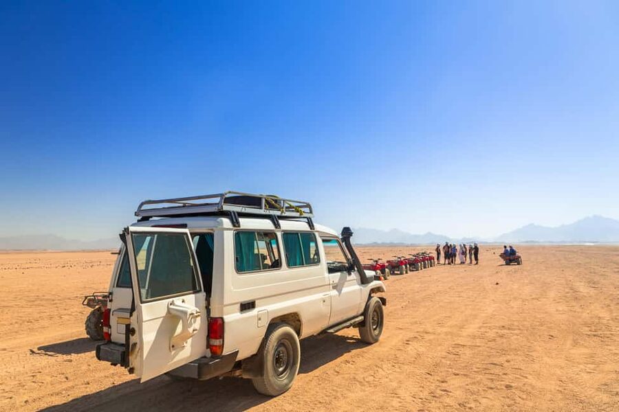 Hurghada: ATV Quad, Jeep and Buggy Safari with BBQ Dinner - Quad biking across open desert
