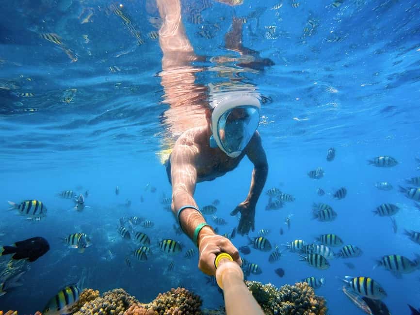 Hurghada: Orange Bay Day Trip with Water Sports and Lunch - Two snorkeling stops on the Red Sea
