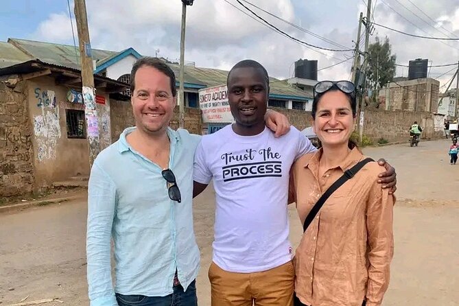Kevins Kibera Slum Tours - The marketplace, main street, and train track