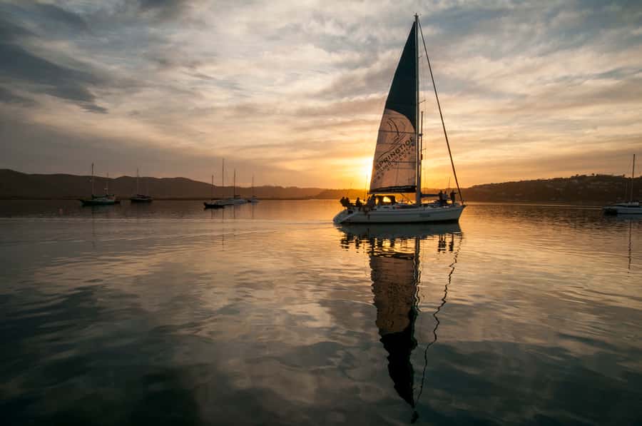 Knysna Sunset Sailing Cruise with Light Dinner and Wine - Across the lagoon toward Knysna Heads