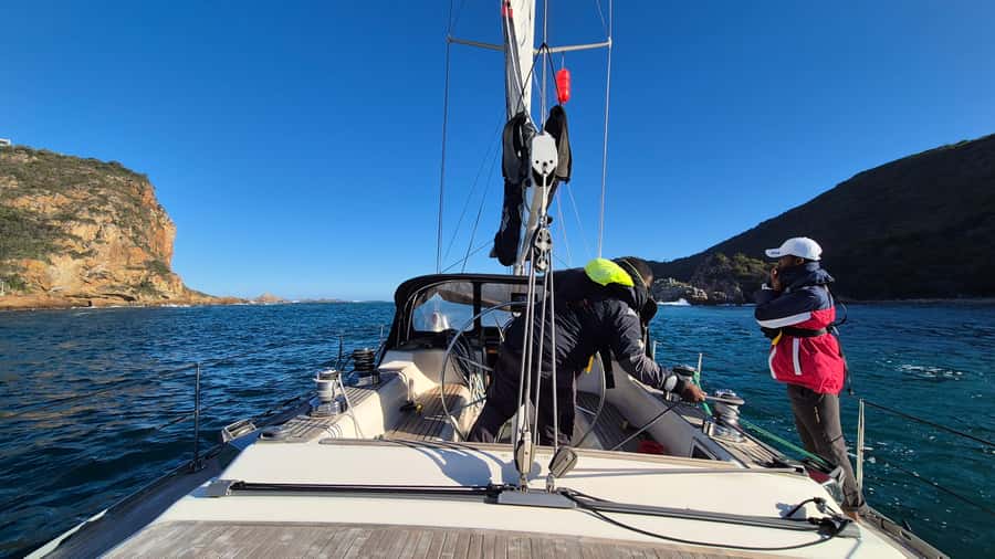 Knysna Sunset Sailing Cruise with Light Dinner and Wine - Sailing with an experienced crew