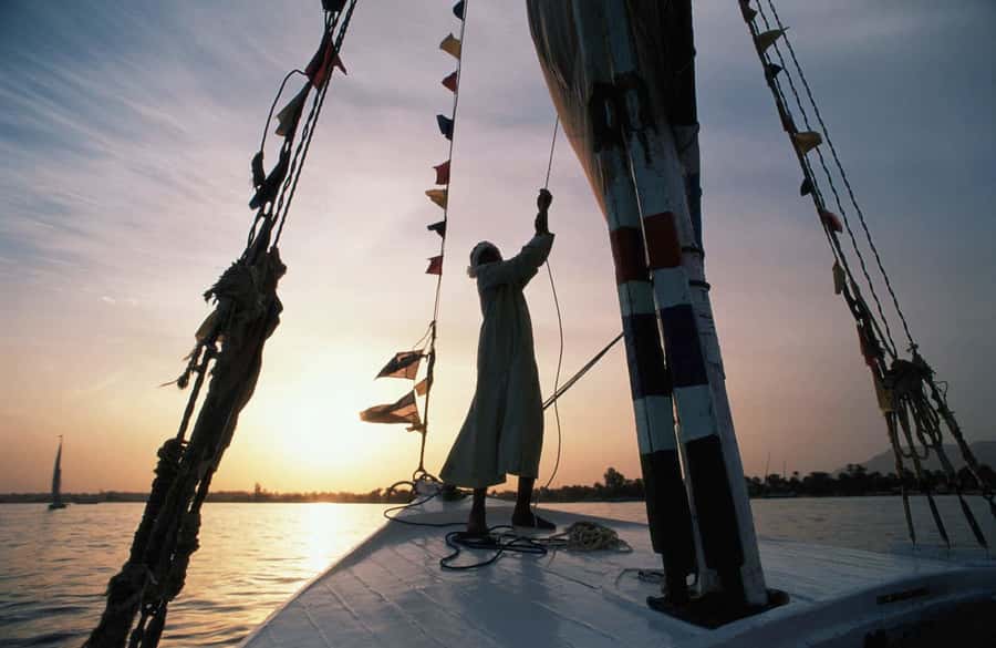 Luxor: Private Felucca Boat Trip with Hotel Pickup - Boarding the traditional felucca