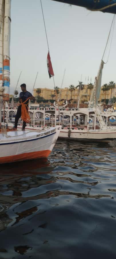 Luxor: Private Felucca Boat Trip with Hotel Pickup - The sunset over the West Bank