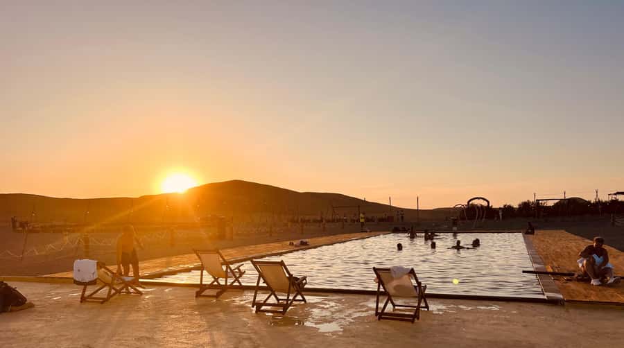Marrakech: Agafay Desert Camel Ride, Dinner, Fire Show - Moroccan dinner served after sunset