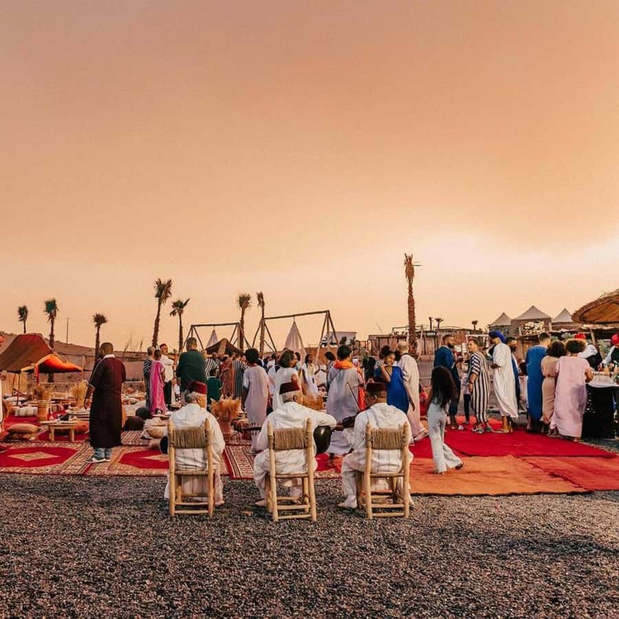 Marrakech: Agafay Desert Dinner Show with Sunset Camel Ride - Riding camels as the sun goes down