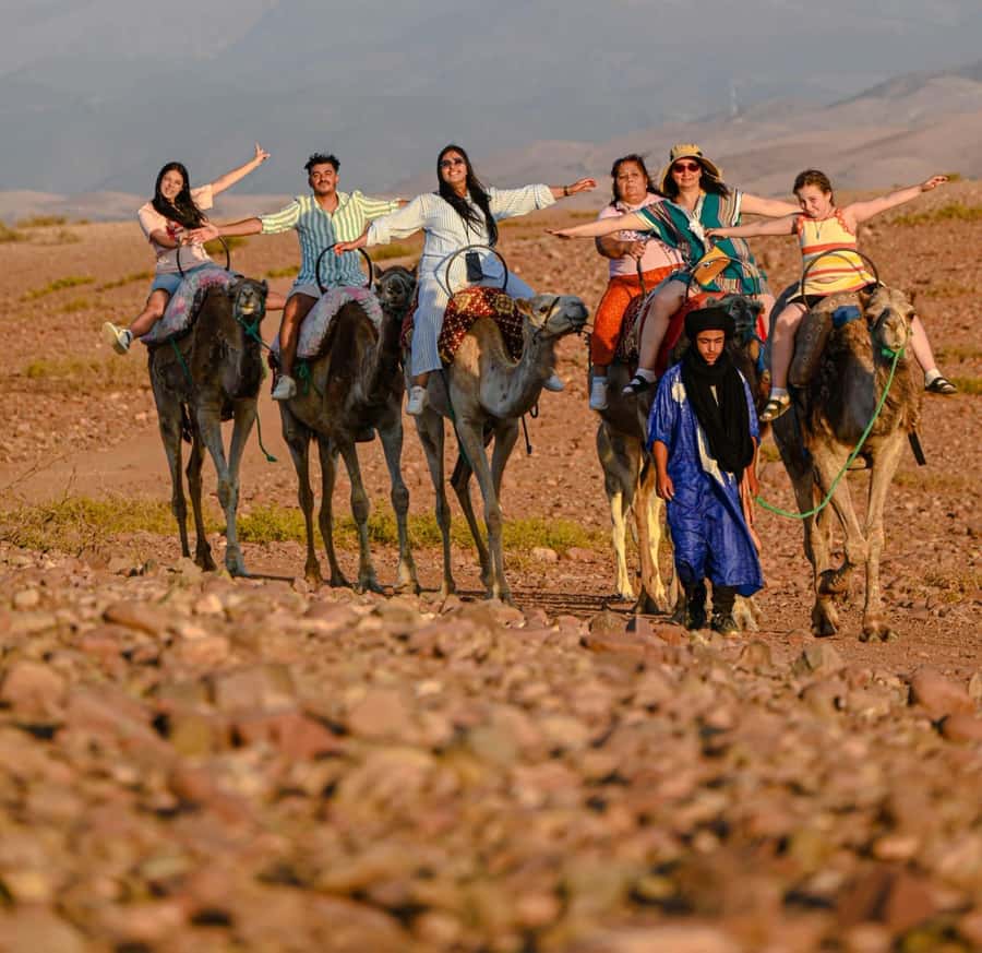 Marrakech: Agafay Desert Quad, Camel Ride & Dinner Show - Leaving Marrakech for the rocky desert