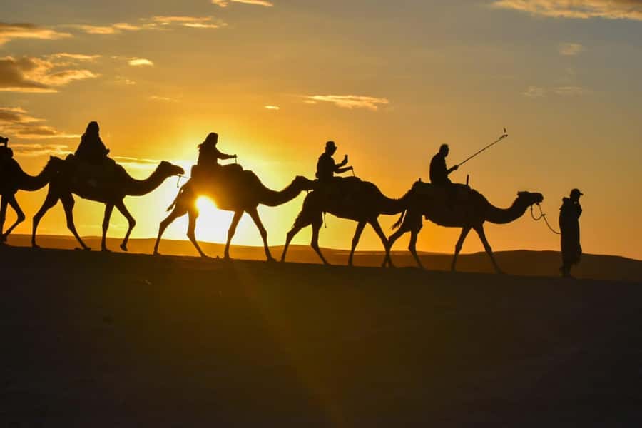 Marrakech: Agafay Desert Sunset, Camel Ride, and Dinner Show - Sunset at the desert camp