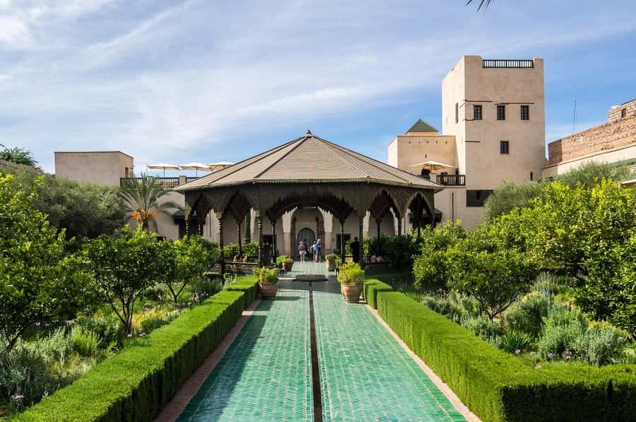 Marrakech: Ben Youssef, Secret Garden, & Souks Walking Tour - Ben Youssef Madrasa is the architectural highlight