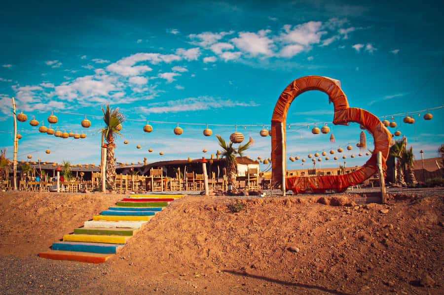 Marrakech: Camel Ride, Dinner, Pool, and Fire Show in Agafay - Music, dancing, and the fire show