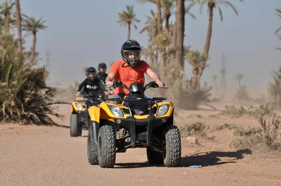 Marrakech:excursion quad in Oasis palm & jbilat desert,tea - Pickup from Marrakech and the medina meeting point
