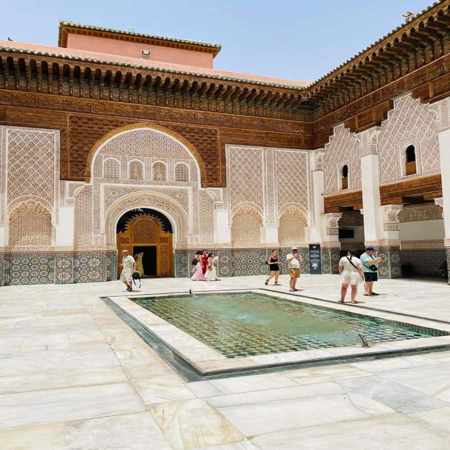 Marrakech: Madrasa Ben Youssef, Secret Garden & Medina Tour - Shared tour, private tour, and entrance fees