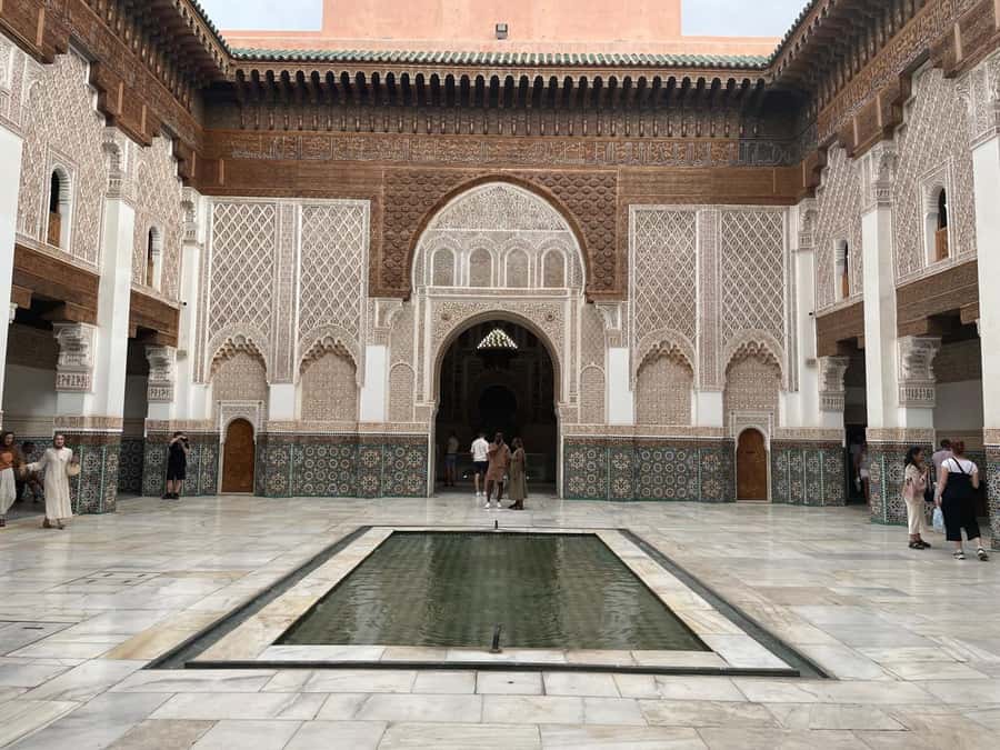 Marrakech: Madrasa Ben Youssef, Secret Garden & Medina Tour - Ben Youssef Madrasa and its decorated courtyard