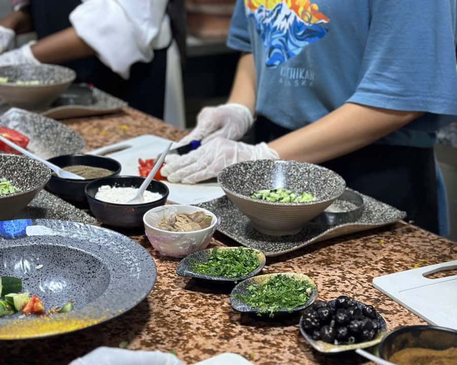 Marrakech: Moroccan Cooking Class with Pickup - A Moroccan cooking class with a seat at the table