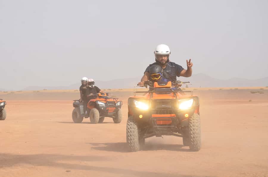 Marrakech: Palmeraie Guided Quad Tour with Tea Break - The first 45 minutes through palms and dusty tracks