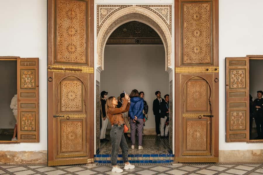 Marrakech: Saadian Tombs & Bahia Palace, Medina Guided Tour - Walking through the souks