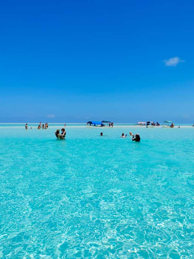 Matemwe: Mnemba Island Dolphin & Snorkeling Boat Trip - Mnemba’s sandbar and a fruit break