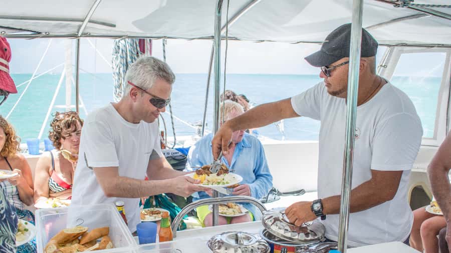 Mauritius: Catamaran Day Cruise to lle aux Cerfs with Lunch - BBQ Lunch With Fish, Chicken, and Fresh Pineapple