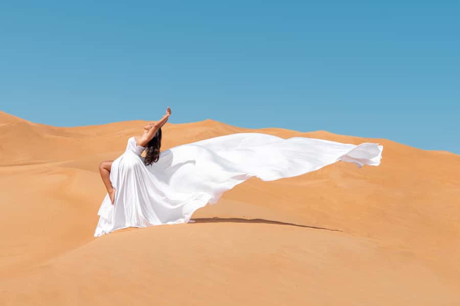 Merzouga: 1-Night in Desert Camp With Dinner & camel ride - Riding across Erg Chebbi at sunset