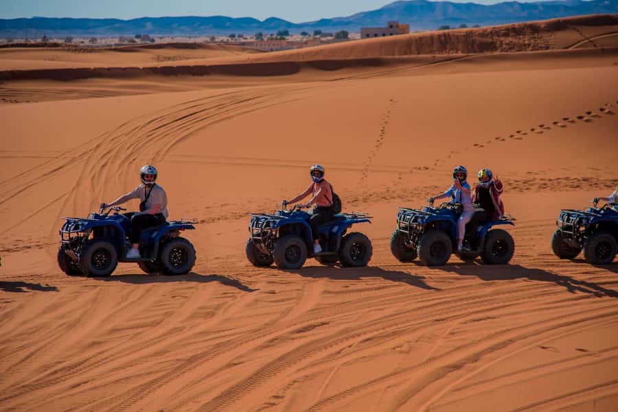 Merzouga : Adventure Quad Bike Safari, & Sandboarding - Pausing for sandboarding on the dunes