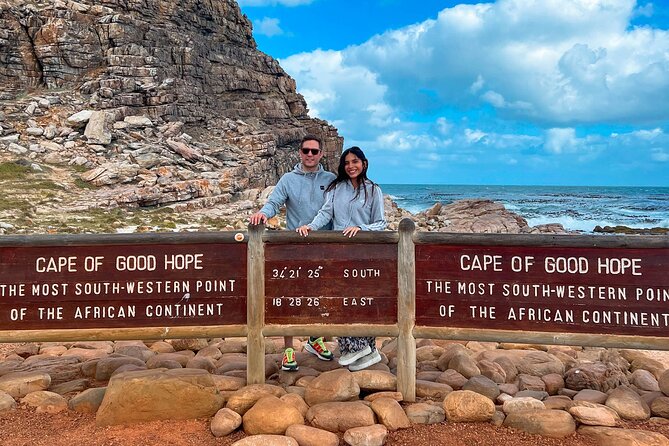 MUST DO: Boulders Beach & Cape Point Full Day Tour #1 Rated - The Cape of Good Hope sign and Diaz Beach
